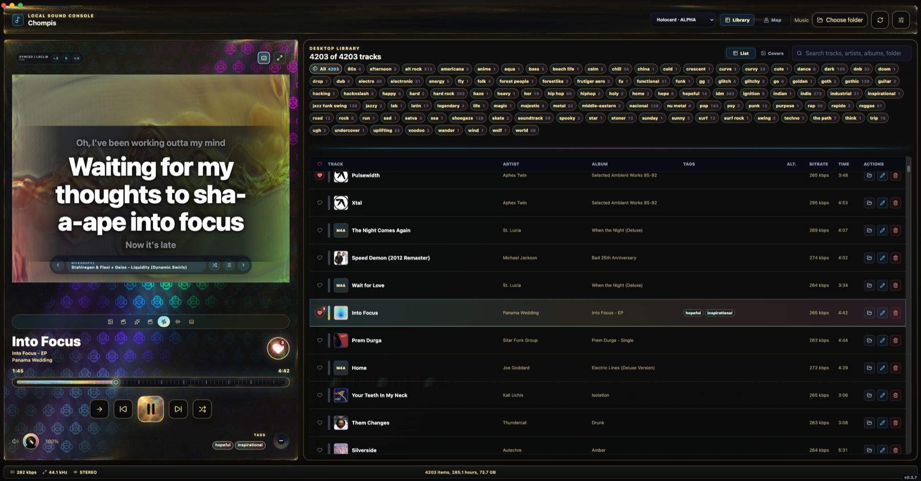 Chompis library and player in the dark Holocard skin, showing lyrics, tags and the music library